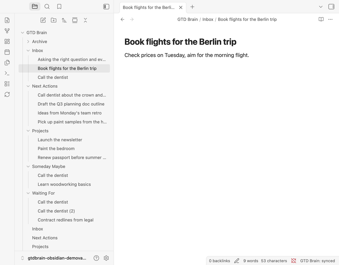 A new note called Book flights for the Berlin trip in the Inbox folder, with one line of body text